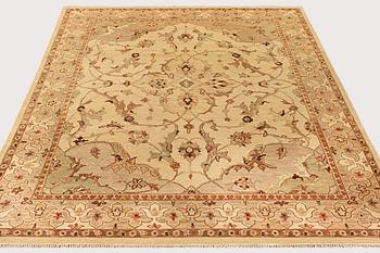 An oriental carpet with a Zeiglar pattern, c. 307 x 249 cm.