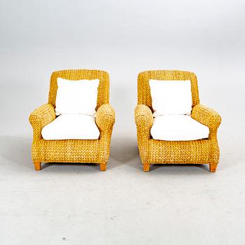 Ralph Lauren home a pair of wide-braided easy chairs, 21st century.