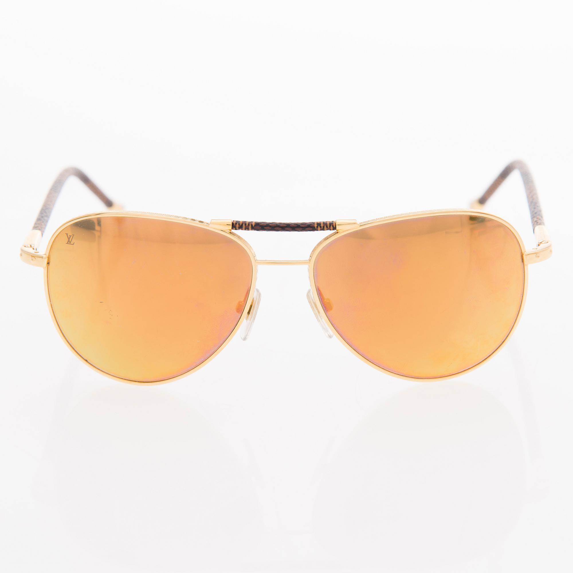 LOUIS VUITTON, A Pair of Conspiration Pilote Sunglasses.
