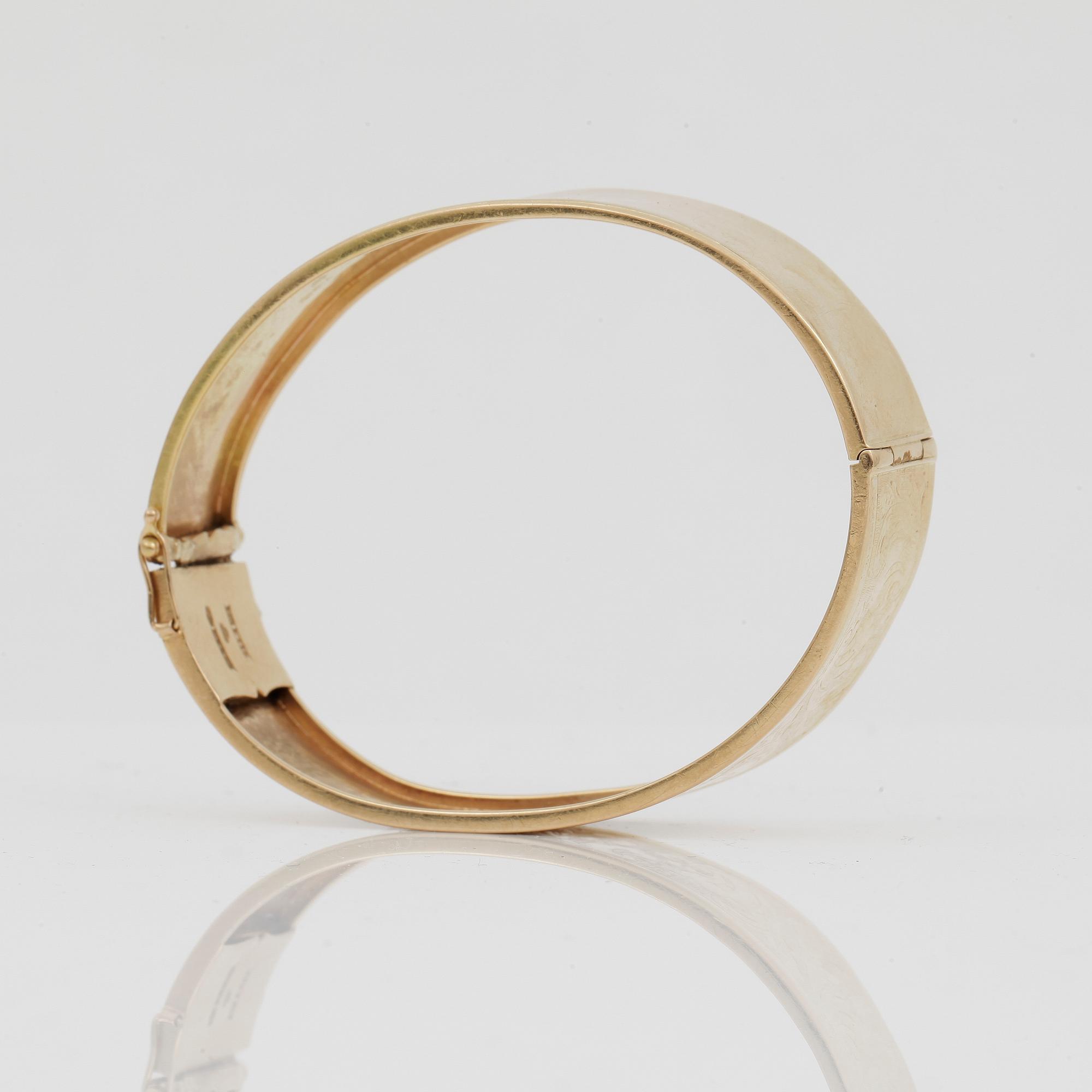 ARMRING, guld 18k, otydliga stämplar, otydliga svenska stämplar, 1900-tal. Vikt ca 23 gram.
