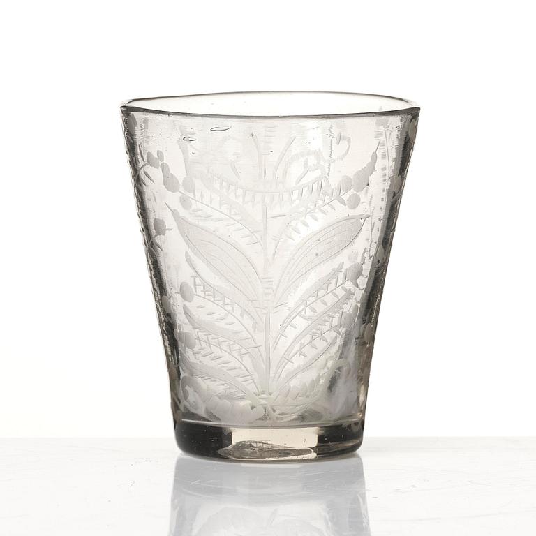 A Swedish glass beaker with the monogram of King Fredrik I, Henrikstorps glass manufactory, early 18th century.