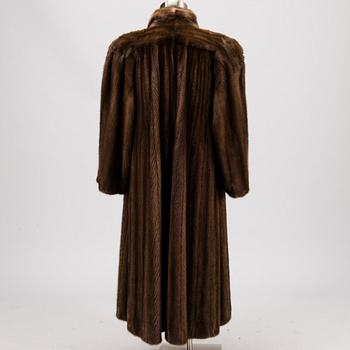 A Long Brown Mink Coat by Grosvenor to Harrods.