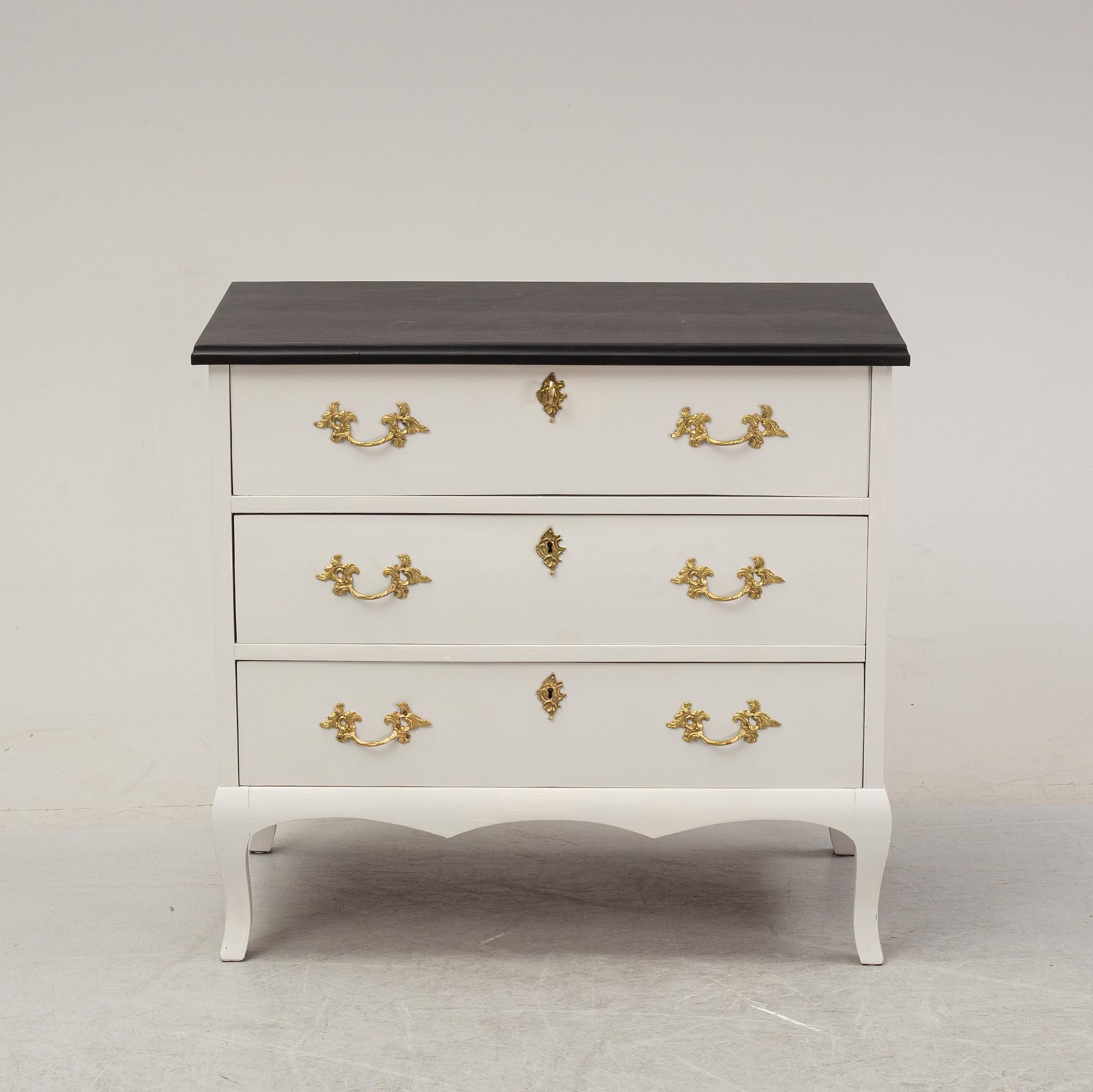 A painted chest of drawers, mid 20th Century.