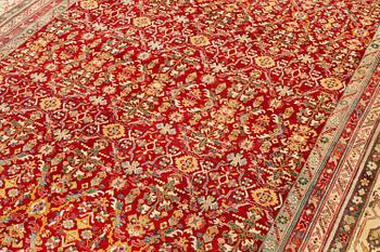 An antique Agra carpet, North India, c. 470 x 370 cm.