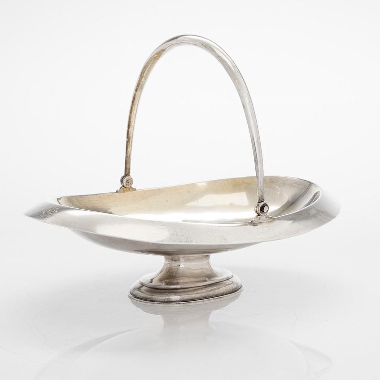 A four-piece silver coffee set, St. Petersburg 1887, original fitted box from Khlebnikov. Sugar tong, Moscow around 190.