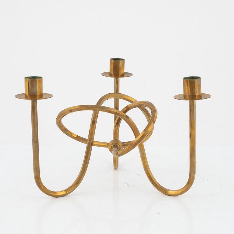 Josef Frank, a brass candelabrum, 'Vänskapsknuten', Firma Svenskt Tenn.