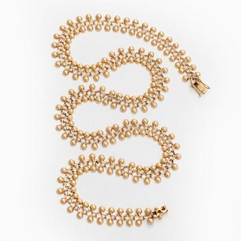 A 14K gold necklace.