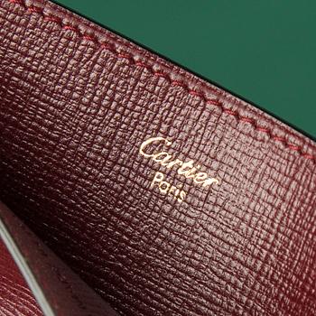 A scarf and a block, CARTIER.