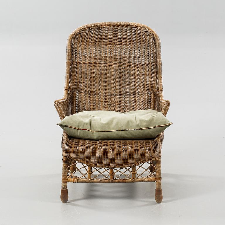 A rattan arm chair from the second half of the 20th century.