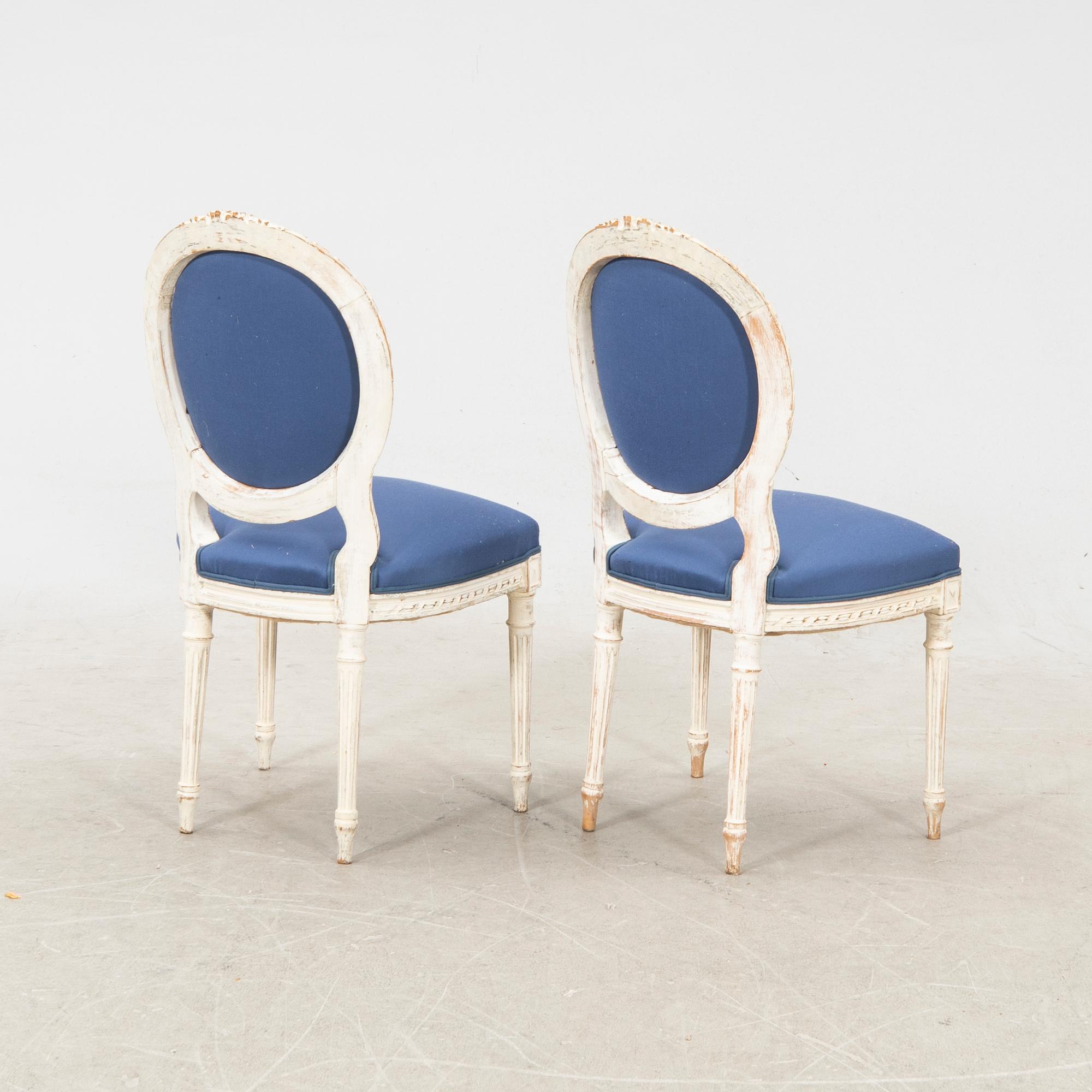 A pair of painted Louis XZVI style chairs first half of the 20th century.
