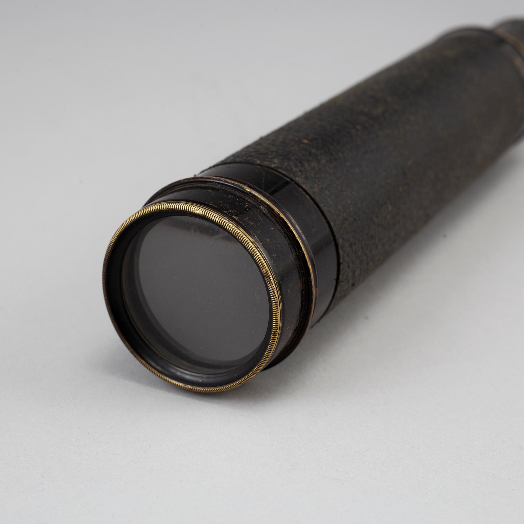 A telescope, circa 1900.