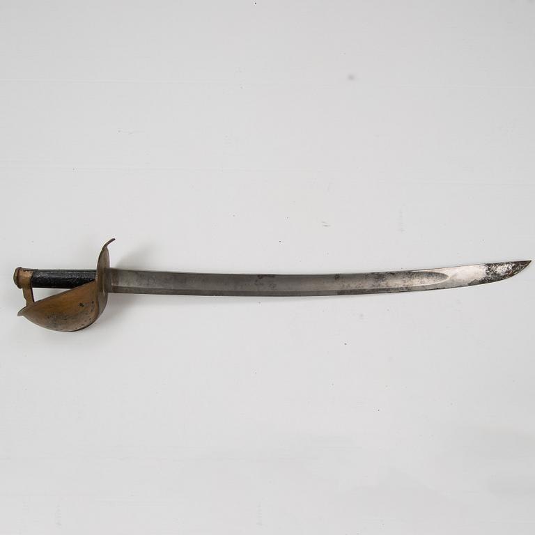 A Imperial German Navy cutlass with scabbard.