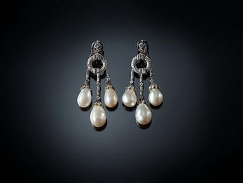 A pair of natural drop-shaped saltwater pearl and diamond Girandole earrings.