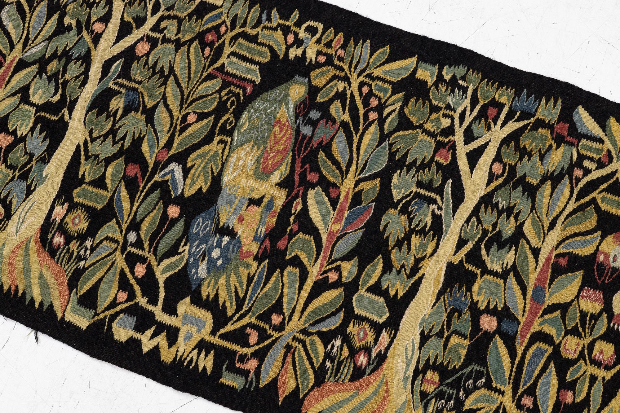 A sled cushion, Skåne, early 20th century, c. 144 x 57 cm.