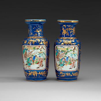 483. A pair of powder blue and famille rose vases, late Qing dynasty (1644-1912).