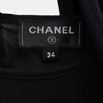 Chanel, A black silk top, size 34.
