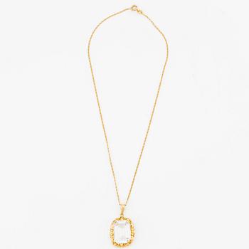 Hänge 18K guld med syntetisk vit sten samt guldkedja Uno A erre.