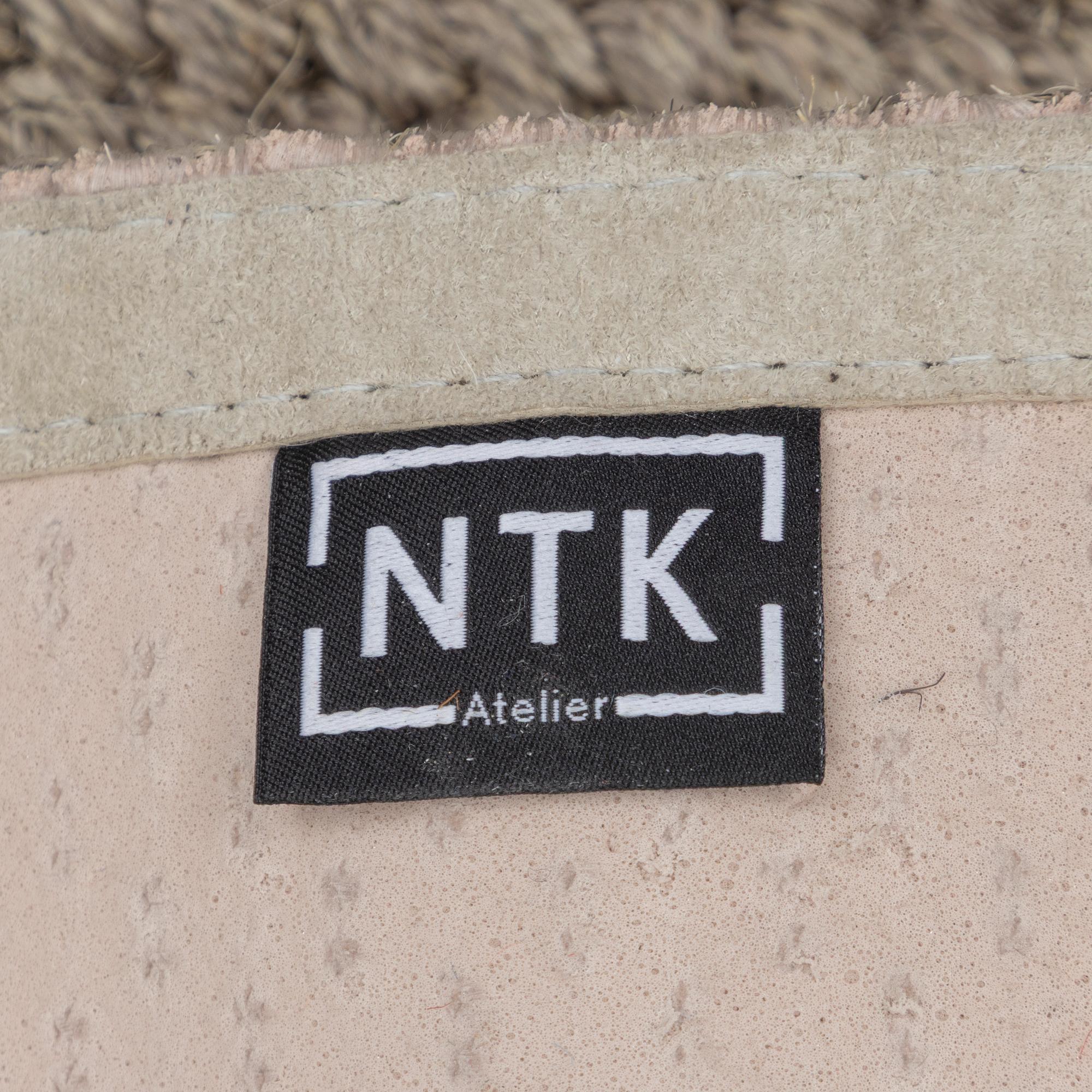 A runner carpet from NTK Atelier, Sweden, c. 448 x 87 cm.