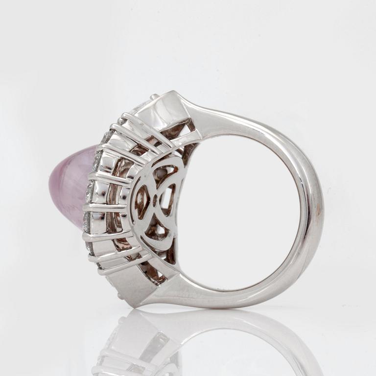 An unheated pink sapphire and diamond ring.