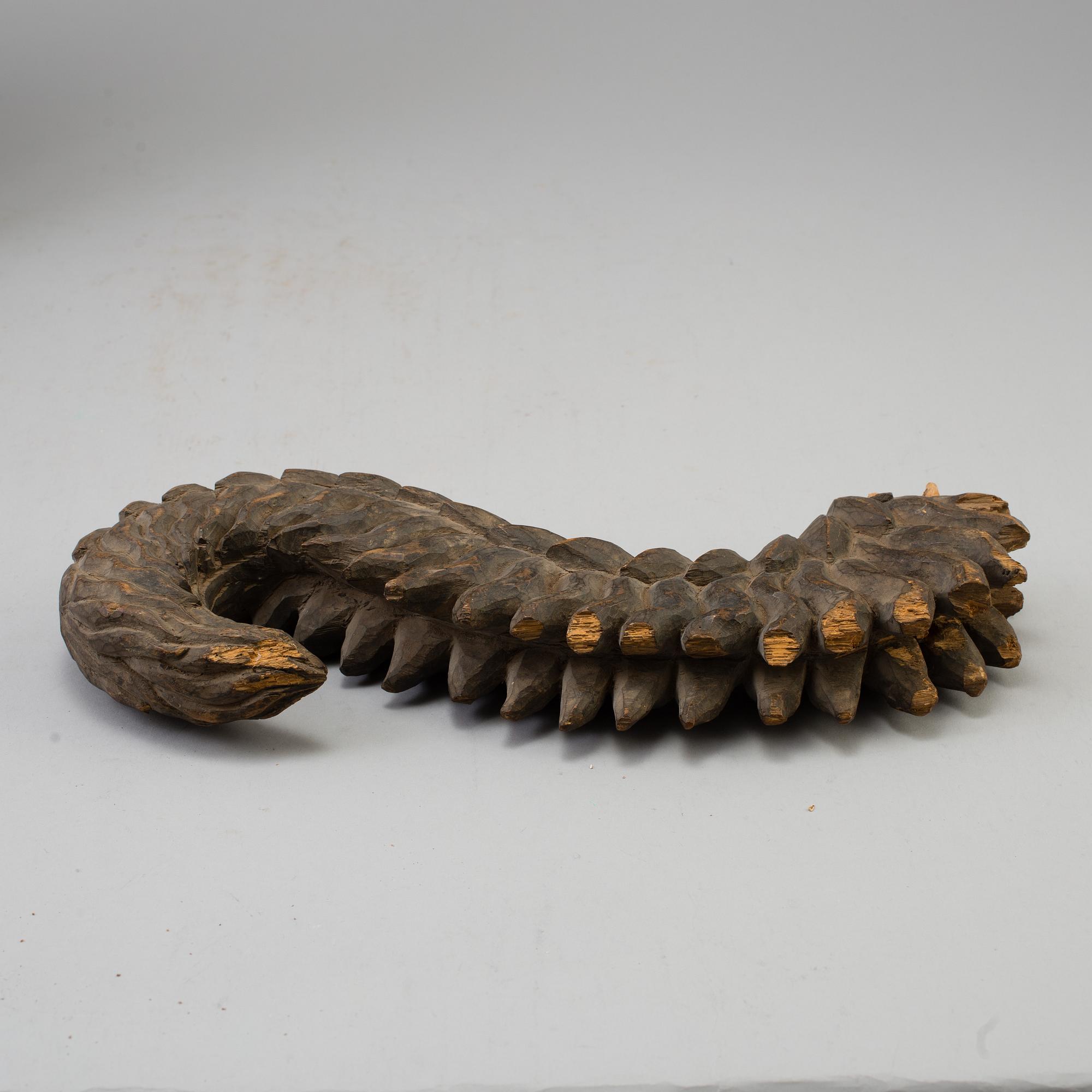A wooden mythical beast, Southeast Asia, early 20th Century.