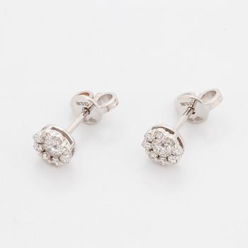 Brilliant-cut diamond earrings.