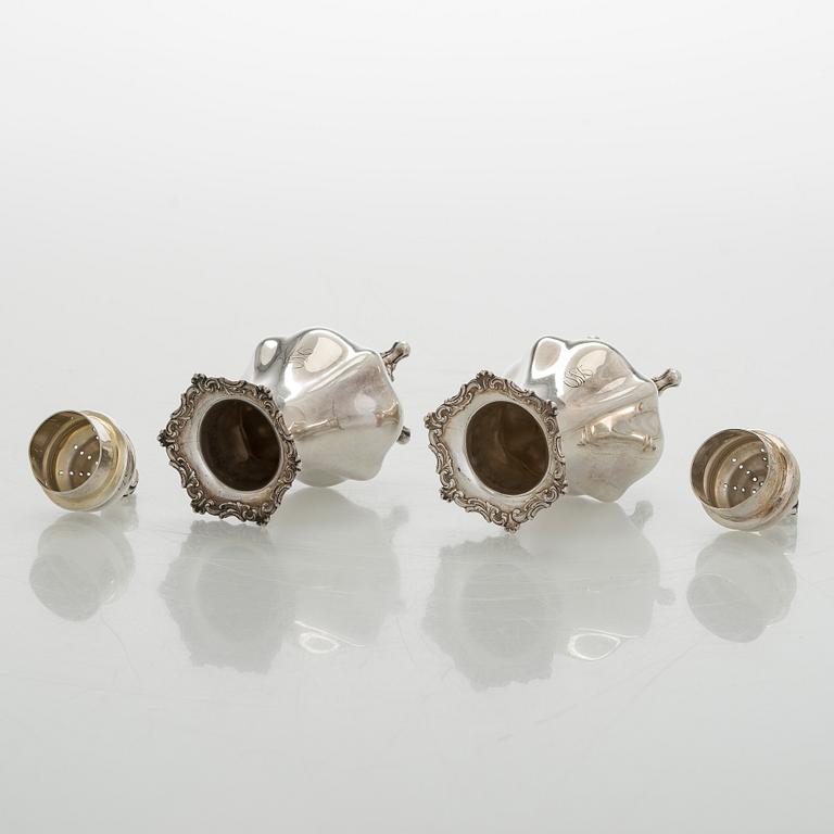 Black Starr & Frost, a pair of sterling silver shakers and sugar bowls, USA around 1900, Gorham pair of sterling spoons.