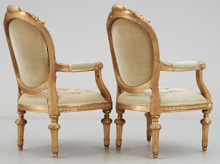 A pair of south European 19th century armchairs.
