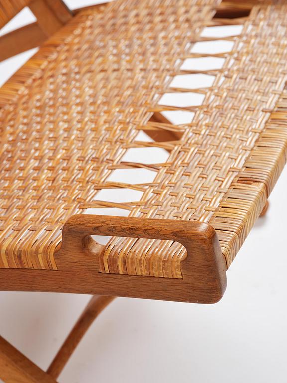 Hans J. Wegner, a foldable easy chair model 512, Johannes Hansen, Copenhagen, 1950s-60s.