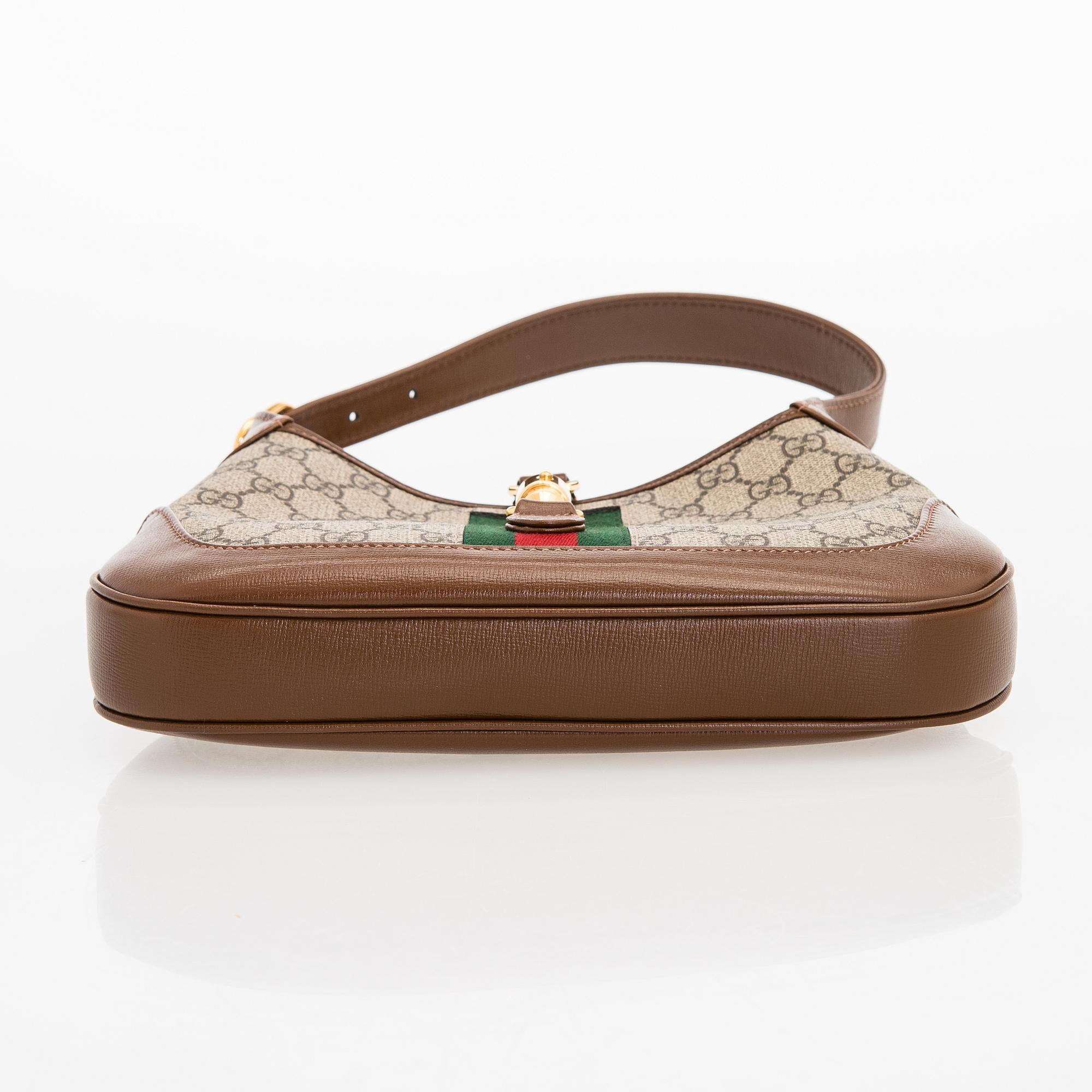 Gucci, a monogram 'Jackie' Bag.