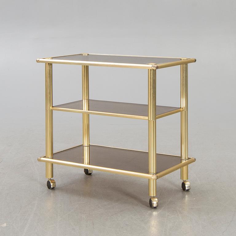 A brass serving trolley later part of the 20th century.