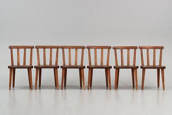 Axel Einar Hjorth, a set of six stained pine "Utö" chairs, Nordiska Kompaniet, Sweden, 1930s.