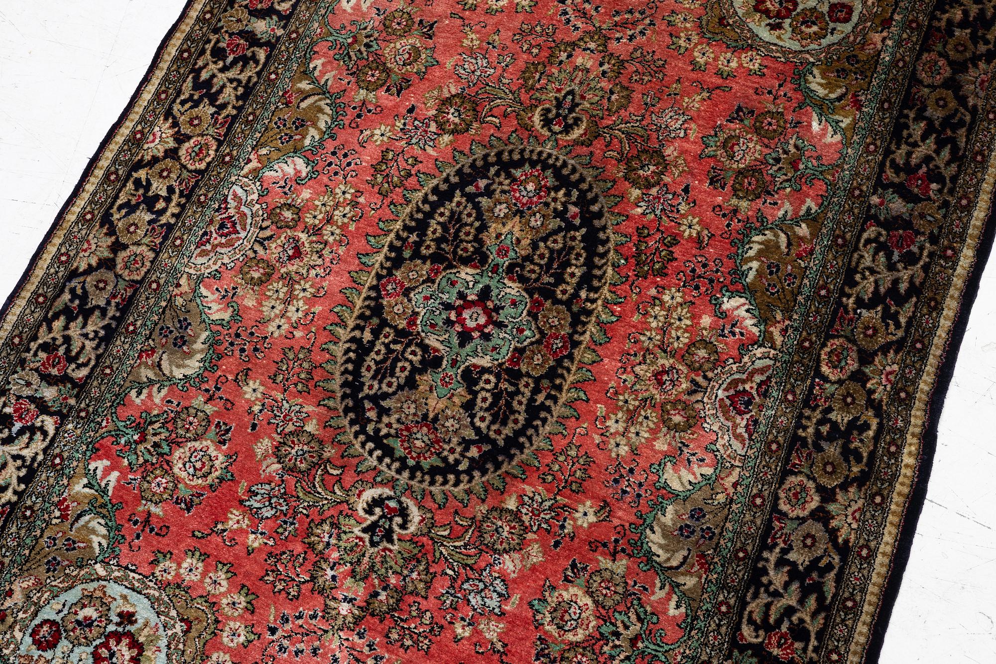Carpet, Ghom, silk, semi-antique, approx. 170 x 104 cm.
