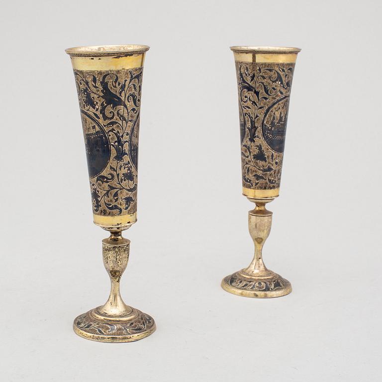 Two similar silver-gilt champagne flutes, unidentified makers mark, Moscow 1843.