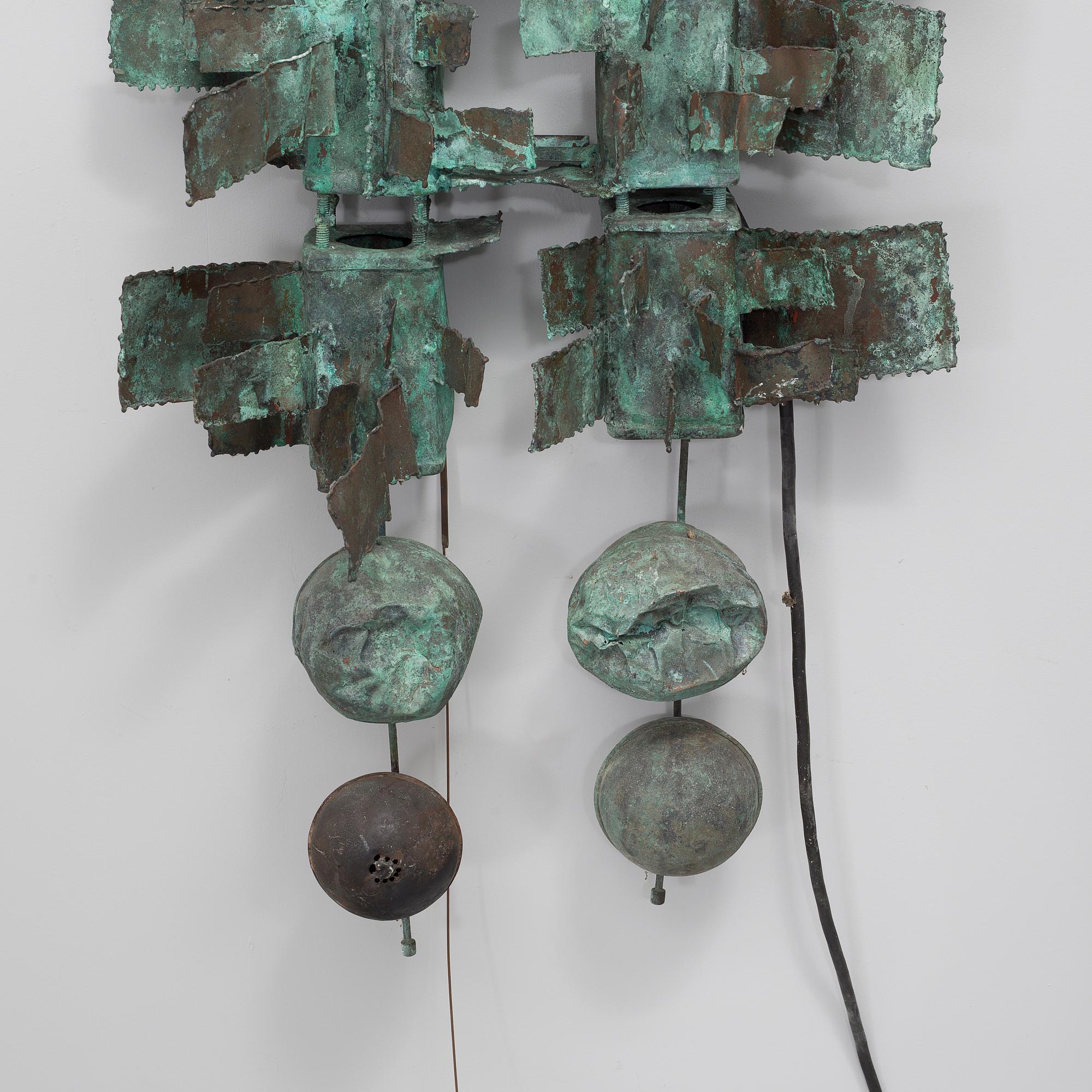 a patinated metal sculpture,