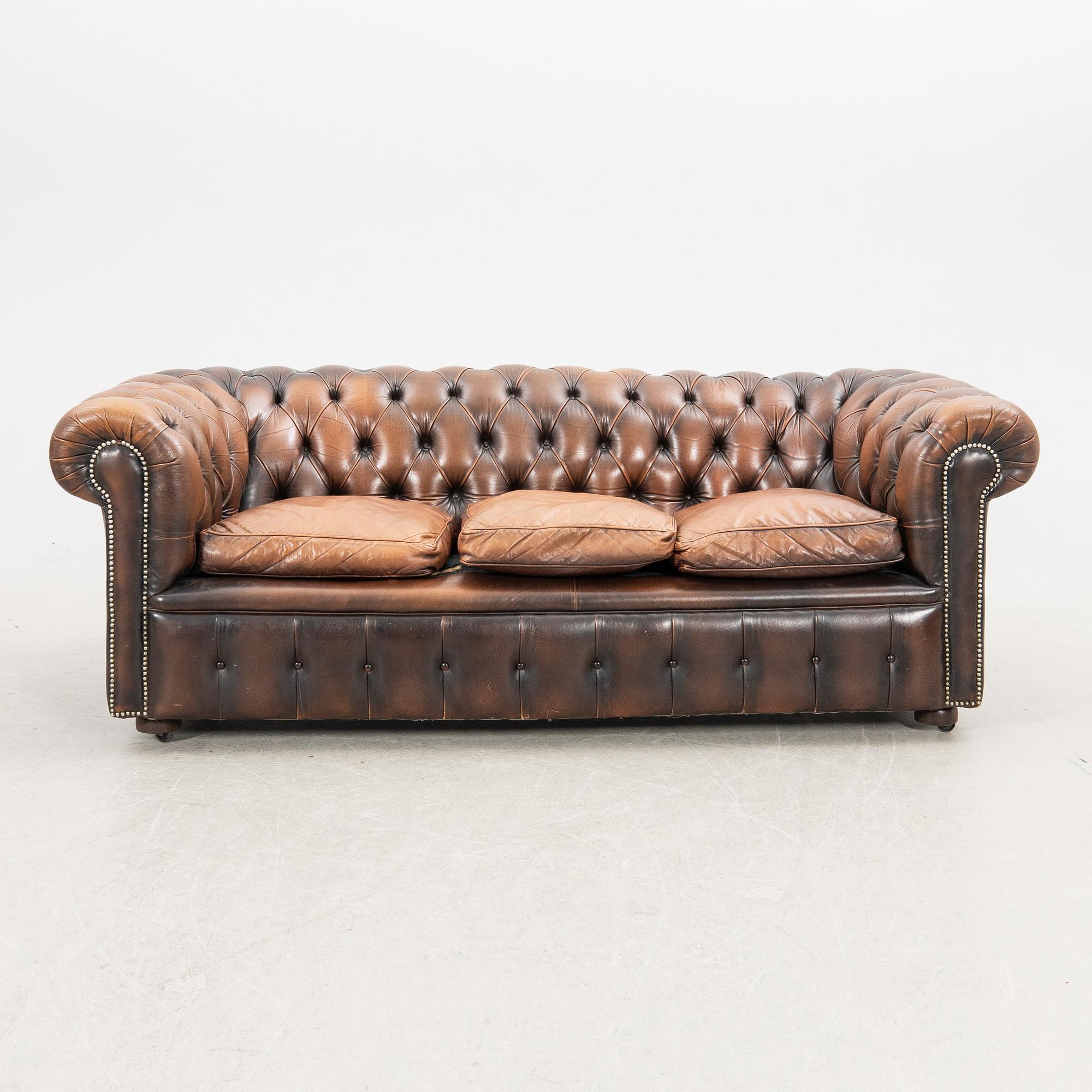 Sofa and armchair, Chesterfield, 20th century.