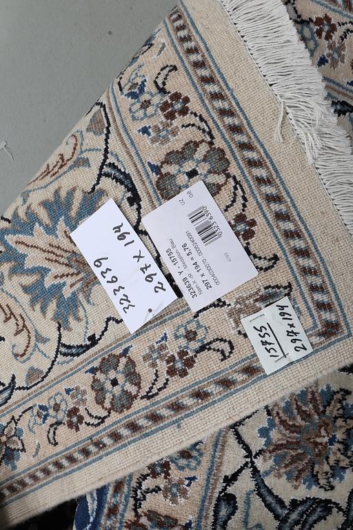 A carpet, Nain, part silk, ca 297 x 194 cm.