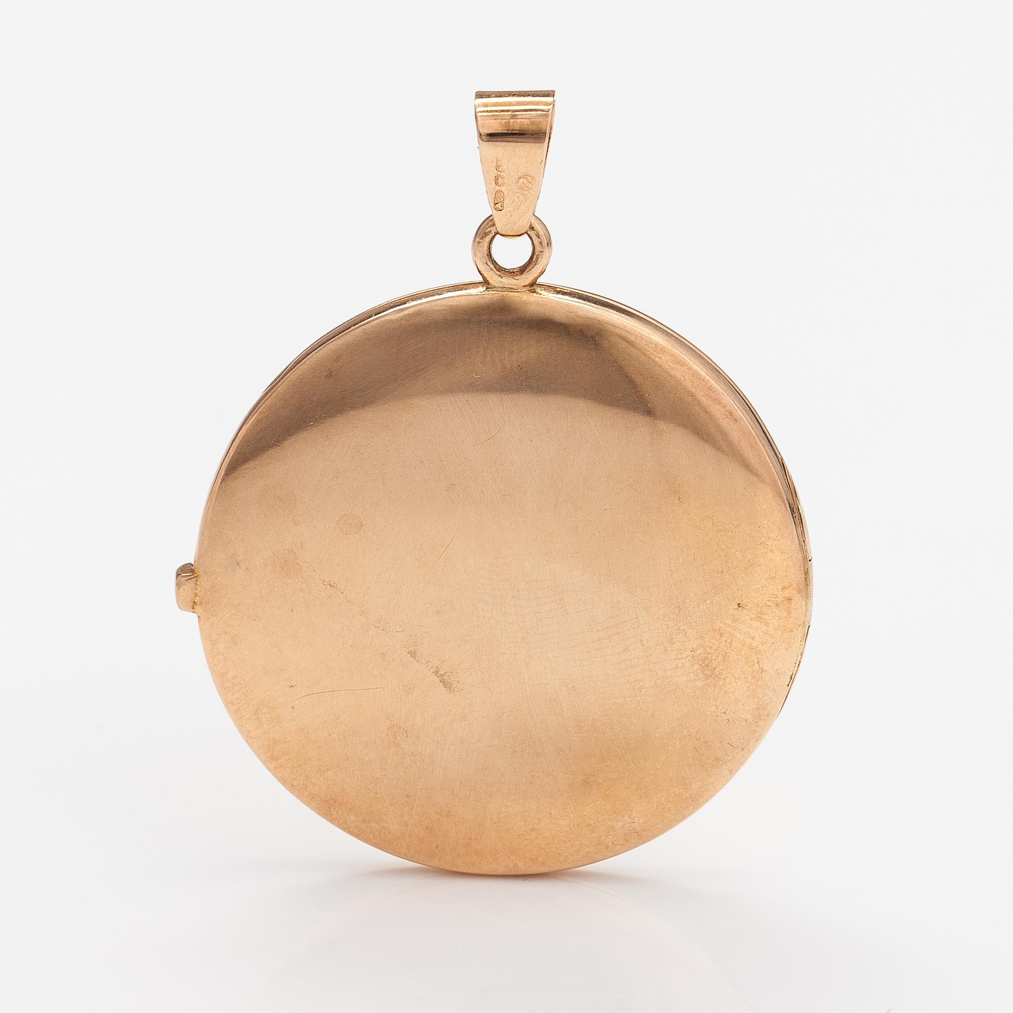 A 14K gold locket. Finnish import marks.