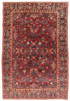 A semi-antique Sarouk carpet, c 275 x 185 cm.