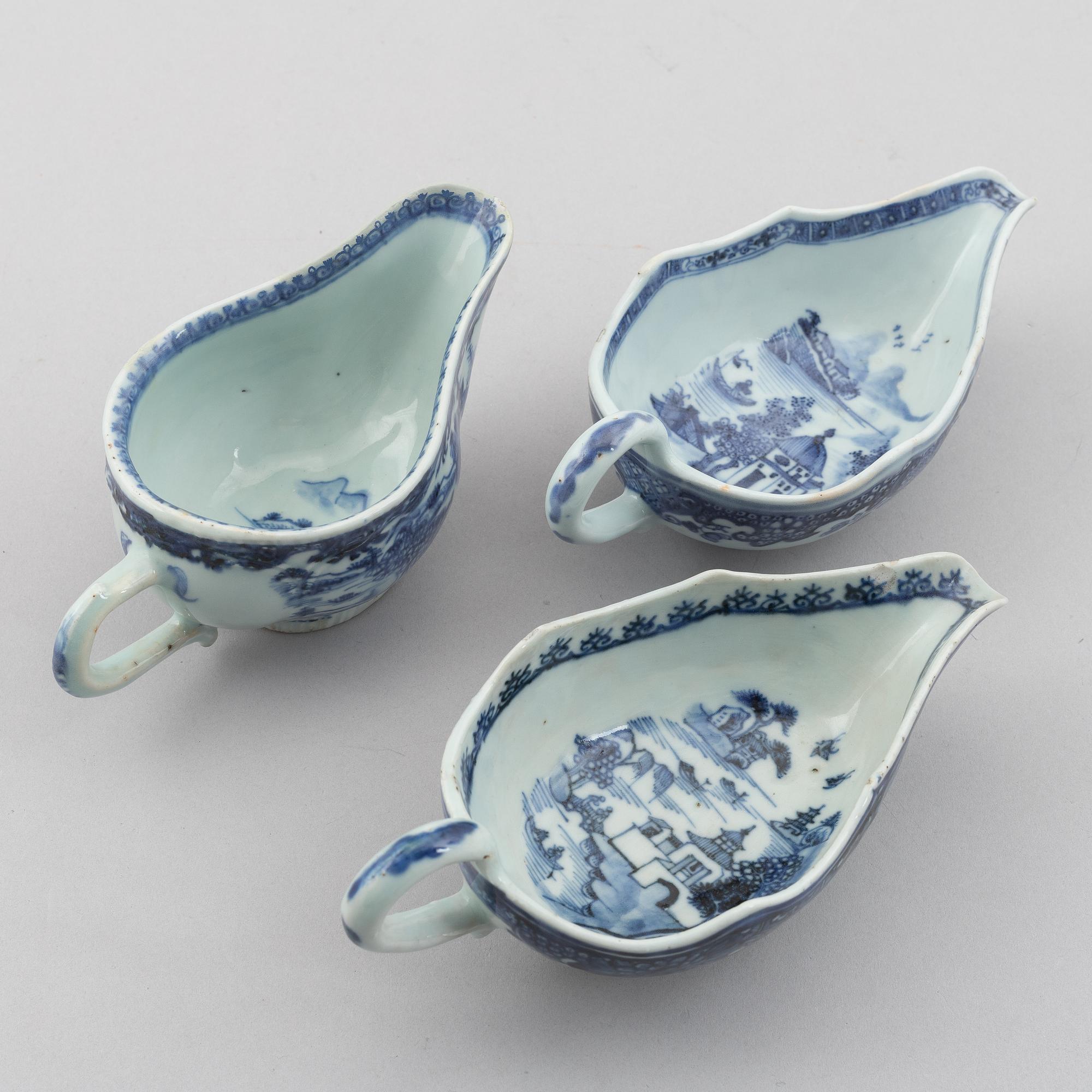 A group of three Chinese blue and white sauce boats, Qing dynsty, Qianlong (1736-95).
