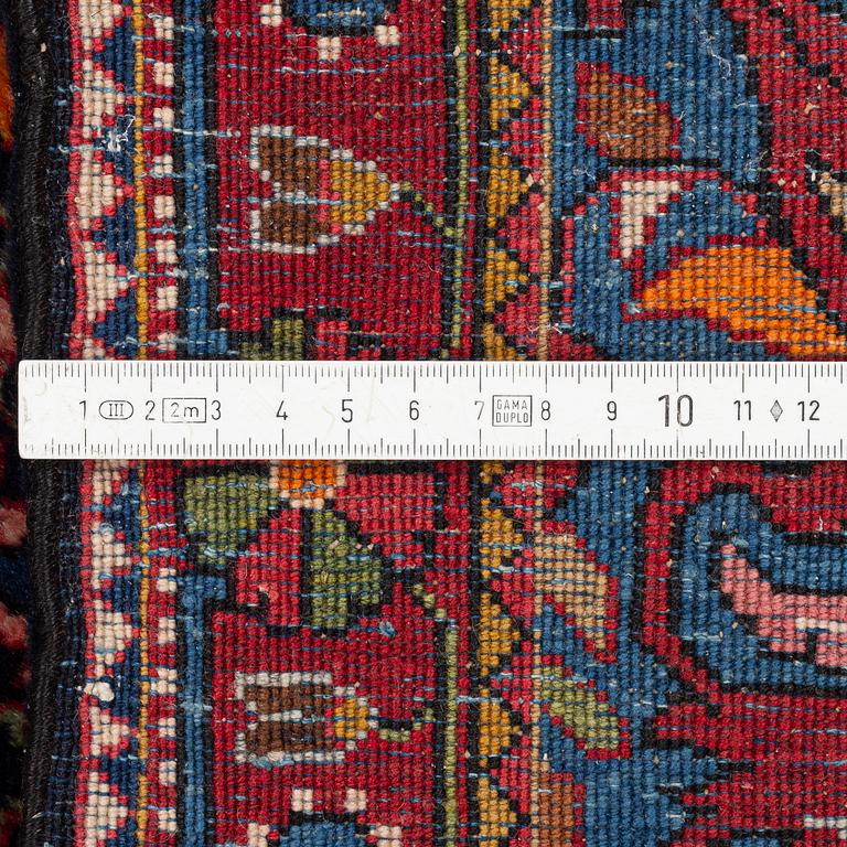 A Sarouk/Jozan rug, c. 86 x 64 cm.