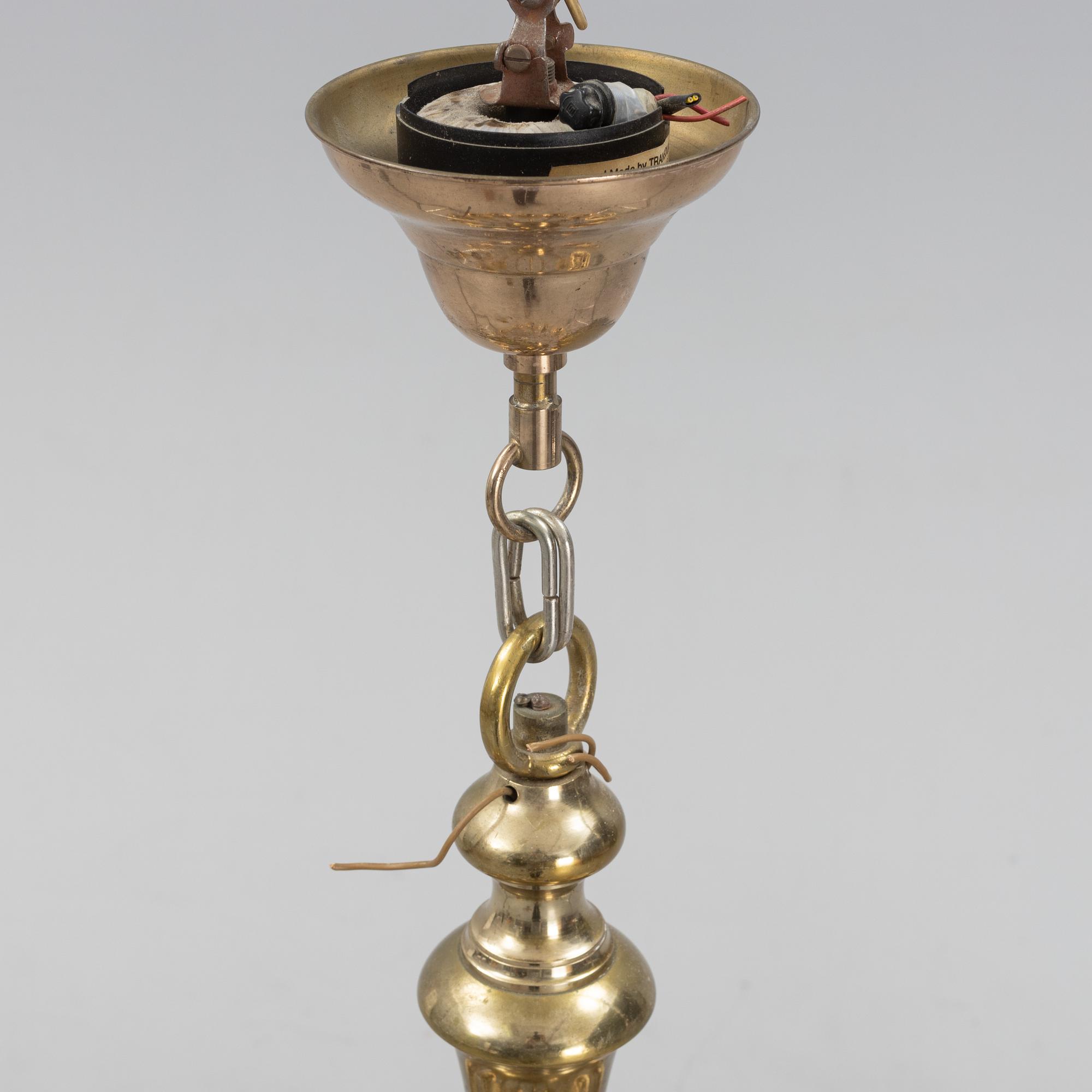 A brass Baroque style chandelier, 20th Century.