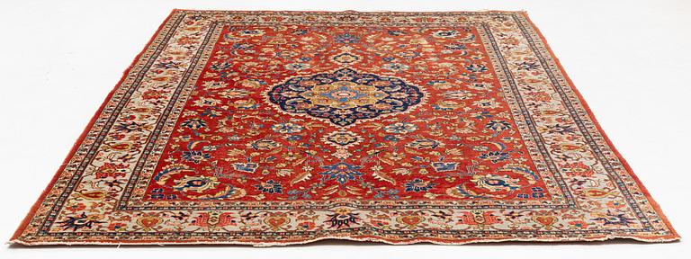 A oriental carpet, ca 320 x 223 cm.
