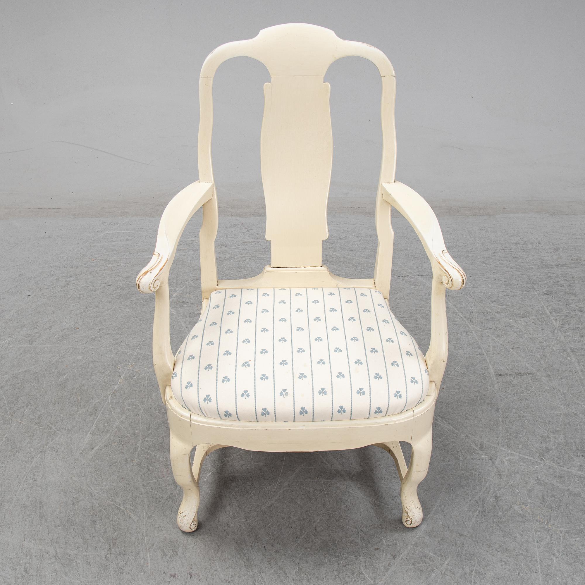 A set of six chairs and a pair of armchairs, rococo style, early 20th century.