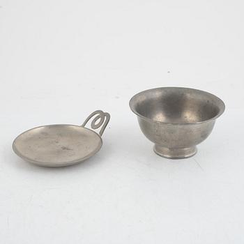 A pewter sugar bowl, cream jug, bowl and dish by Svenskt Tenn 1930s-1950s.