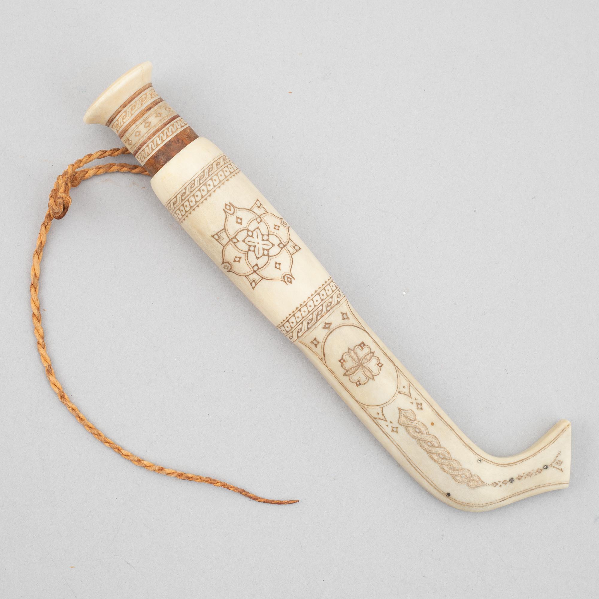 Olof Tomas Svonni, a reindeer horn knife, signed.