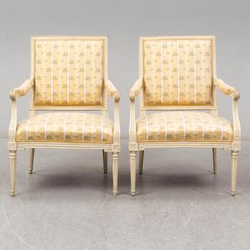 A pair of late 18th century Louis XVI armchairs.