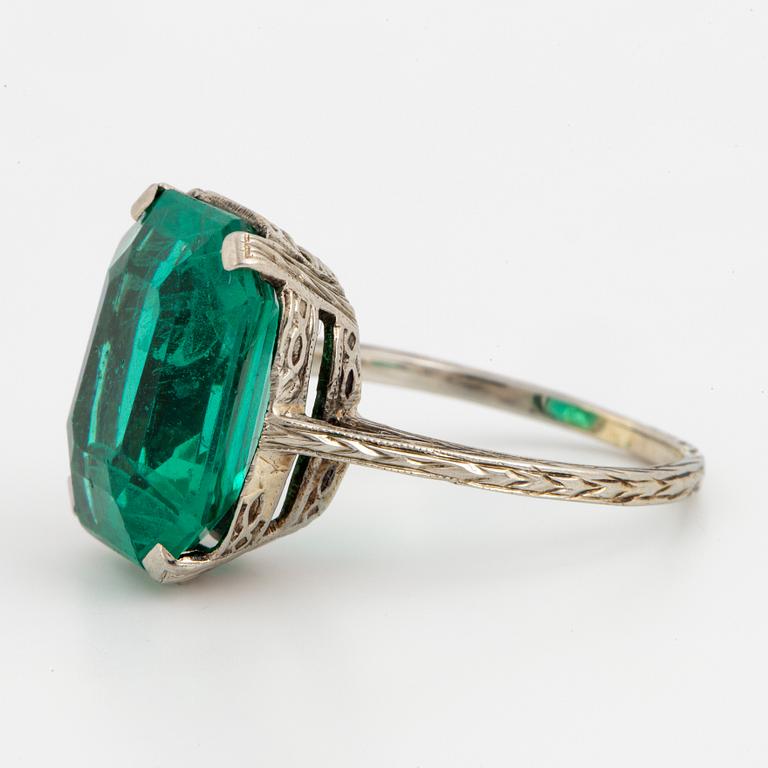 Synthetic emerald cocktail ring.