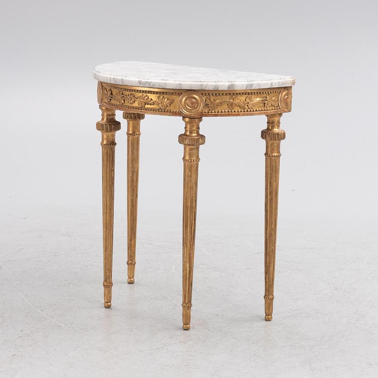 A Gustavian giltwood and white marble console table, Stockholm, late 18th century.