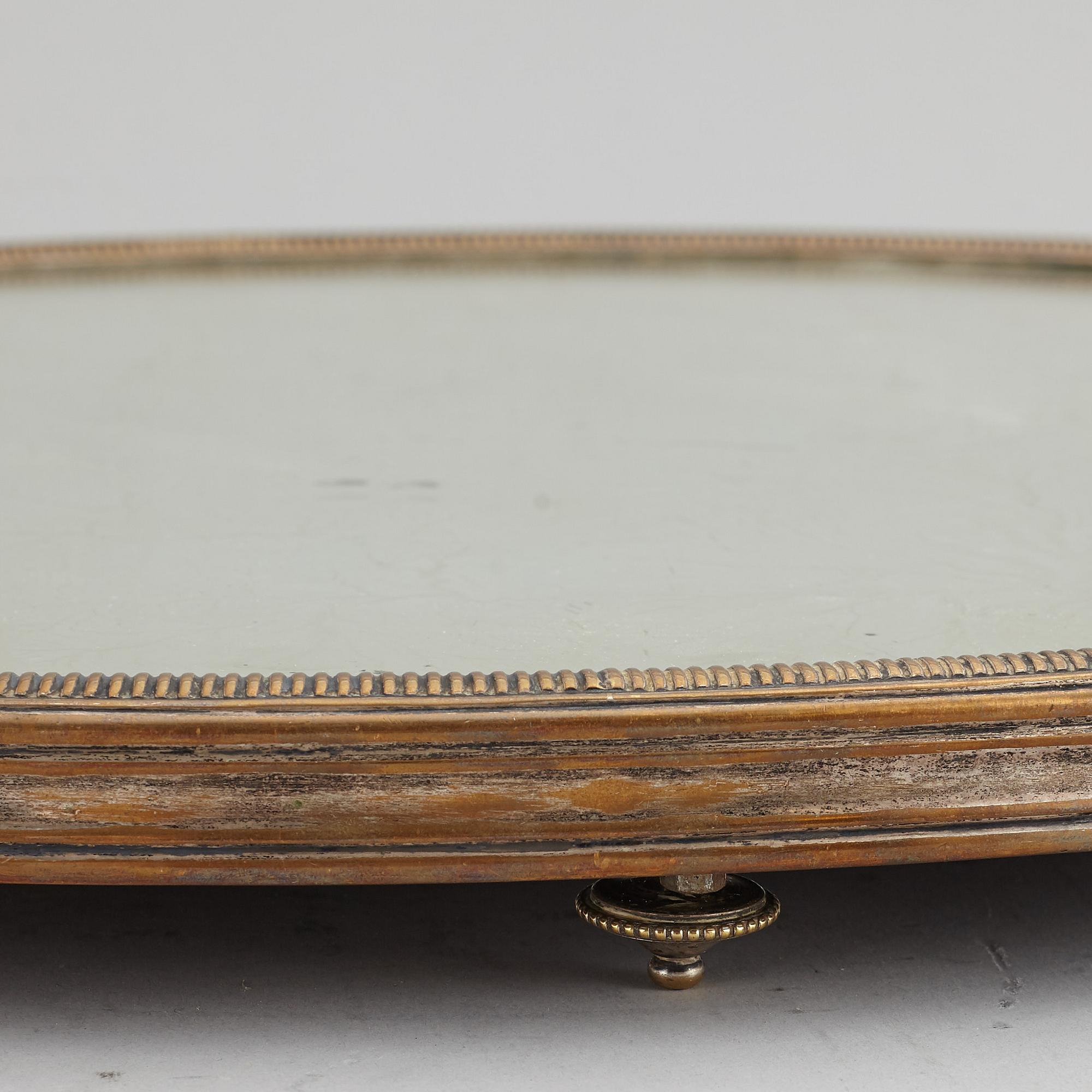 A argent hache table top, England, circa 1900.