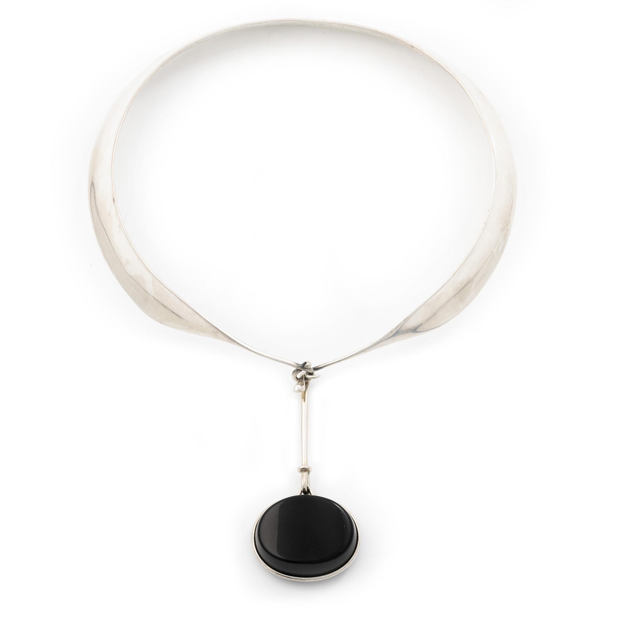 Vivianna Torun Bülow-Hübe, a sterling silver necklace with a obsidian pendant, Georg Jensen, Denmark.